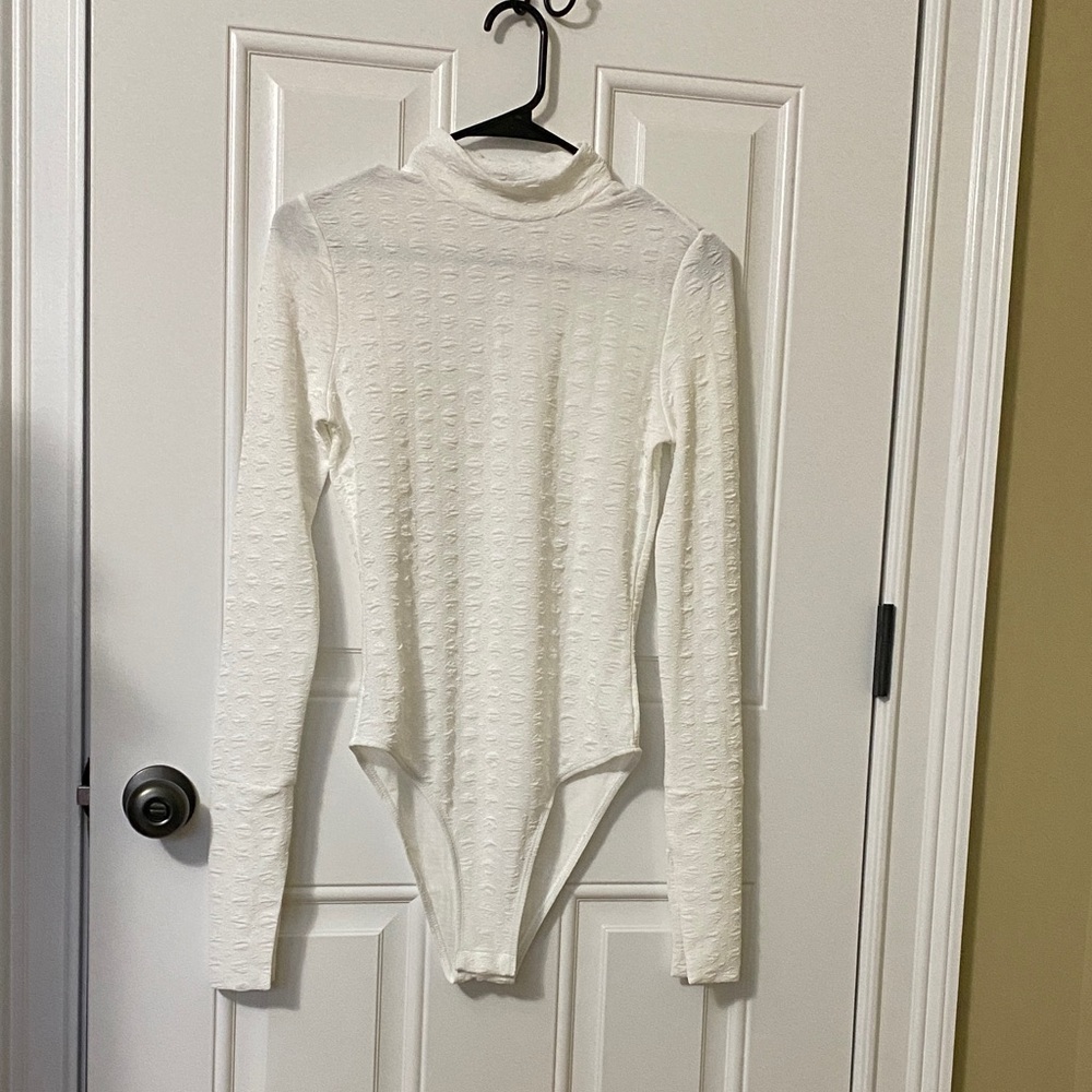 Elegant White Long Sleeve Bodysuit